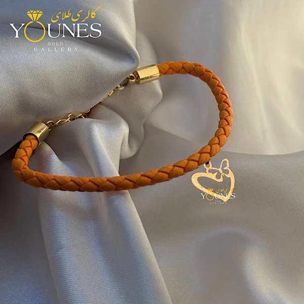 دستبند چرم نارنجی شاپرک قلبی طلا